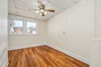 Bedroom #4 features double windows, ceiling fan and an ensuite bath.