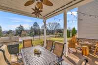 Covered patio/dining is accessed from the french door in the informal dining area. Gas line makes for easy grilling.