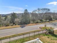 View from the private deck off the primary suite. 9556 Faulkner Square is surrounded by common areas.