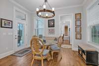 Informal dining area has french door to covered back patio.  Home office/drop zone is accessed via the cased opening on the right.