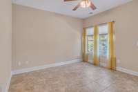 ALTERNATE VIEW OF FLORIDA ROOM WITH BEAUTIFUL FLOORING AND LOTS OF NATURAL LIGHT !!!!!