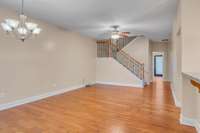 VIEW OF LIVING AREA WITH BEAUTIFUL HARDWOOD FLOORS !!!!!