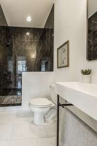 The main floor full bathroom is swoon-worthy.