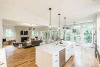 The vent hood in the kitchen and the fireplace are made of the same beautiful stucco material.