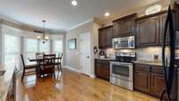 This eat-in kitchen is a delight for both chefs and diners, with open bay windows that flood the space with natural light and offer picturesque views. 1001 Loblolly Dr.  Murfreesboro, TN 37128