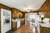 Kitchen and Breakfast room opens to Garage, Living Room and Den.