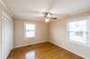 Second Bedroom 11x10 with original wood floor.