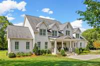 Covered porches are found in the front and the back.  So much to enjoy about this home.