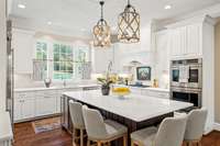 Gorgeous cabinetry and beautiful views highlight this space.