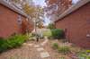 The space between the attached and detached garages is thoughtfully landscaped, creating an aesthetically pleasing transition that harmonizes with the natural surroundings. 19 Antietam Dr.  Woodbury, TN 37190