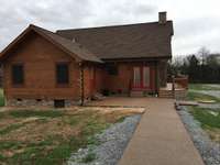 Sidewalk leading from detached garage to house