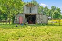 The barn full of aged wood inspired the architecture of the main house