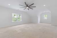 Oversized upstairs bonus room with dedicated half bath.