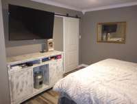 Master Bedroom with sliding door to the closet.