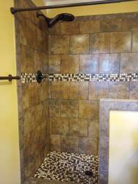 Walk-In Tiled Shower in the Master Bathroom