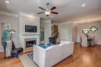 Living space shown with fireplace. Photos of a previously built home.