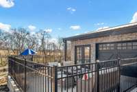 New patio to relax by the pool, and open up all those pool house doors to entertain