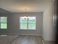 Photo of different home but same floor plan. Finishes will vary.