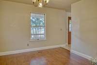 FORMAL DINING ROOM WITH NEW WOOD FLOORING