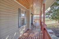 FRONT PORCH WITH BEAUTIFUL WOOD CEILING