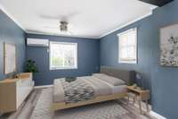 The primary bedroom, custom painted in calming blue, also features a spacious walk in closet and new flooring. Please note this photo is virtually staged.