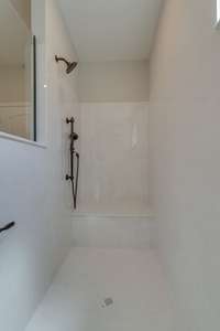 Walk-in shower option in the primary bath Previously built home, actual finishes may vary