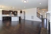 Kitchen and Great Room. Photo is of a similar floor plan, not actual home.