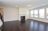 Great Room with loads of natural light. Photo is of a similar floor plan, not actual home.