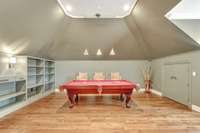 Upstairs entertainment room with pool table (remains).