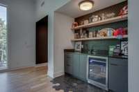 Wet Bar with open shelves in Bonus Room.