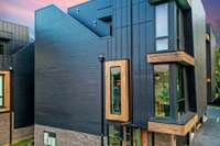 This amazing 3 story home built by Richland Building Partners features an elevator to all three floors plus a rooftop deck!