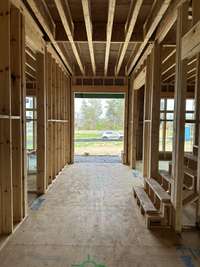 Fabulous Foyer with black iron railing   *this house is under construction  Built by: Legend Homes