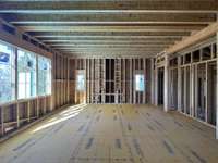 Grand Bonus Room with wet bar  *this home is under construction Photo taken 3/29/24