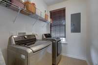 The washer and dryer in laundry room stay with the home