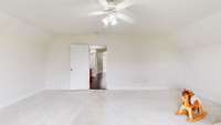 A large bonus room is located over the garage as well. Room for movie watching, ping pong playing, you name it!