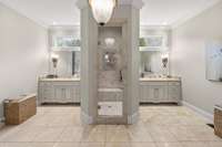 Double vanities with a walk-in shower