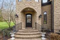 Stone arched doorway makes for a grand entrance
