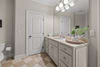 Bedroom #1 ensuite bathroom with linen closet and walk-in shower.