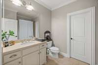 Bedroom #3 ensuite bathroom with walk-in closet and tub shower combo.