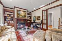 Lovely fireplace and built-in shelving in the study