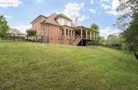 The wrought-iron fenced backyard gives you peace of mind for your children and pets!