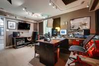 Basement Home Office or Recording Studio or a Pod Cast Studio, take your pick.  This basement office has a window.