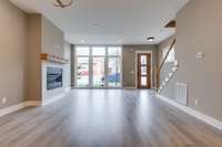 Large windows letting in natural sunlight, create a view from kitchen of lots of light for the kitchen and great room filled with light and is so inviting!