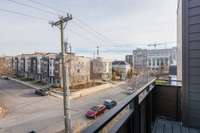 The second-level master deck overlooking Belmont Medical School is an inspiring spot. Picture a spacious deck, maybe adorned with comfortable outdoor furniture