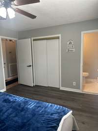 Primary Bedroom with half bathroom