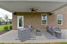 Optional covered patio or morning room on rear of home. Covered patio shown here.