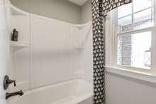 Jack and Jill bathrooms upstairs. Tiled shower available.