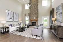 Two story great room or media room added above! 3 styles of gas fireplaces offered.