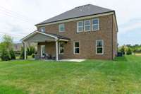 Optional covered patio or morning room on rear of home. Covered patio shown here.