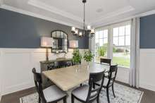 Choose between a dining or study on the main level at NO cost! Dining room shown here. Study adds glass French doors.